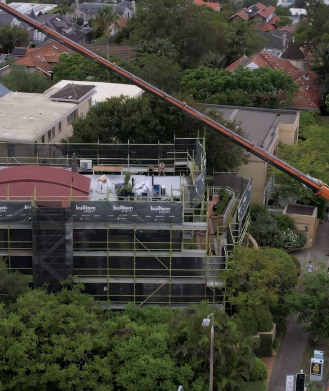 Aerial view of a Builtom Projects site with scaffolding over a Sydney rooftop